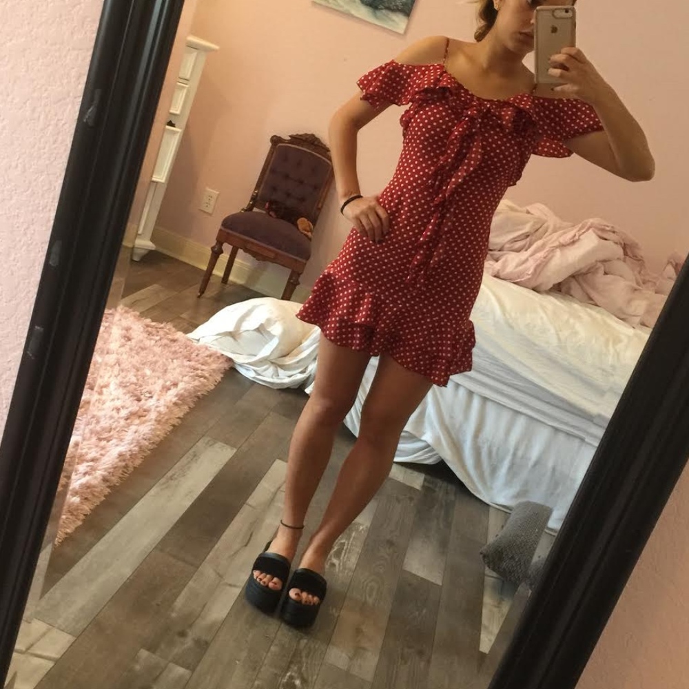 frilly whit polka dotted red dress
